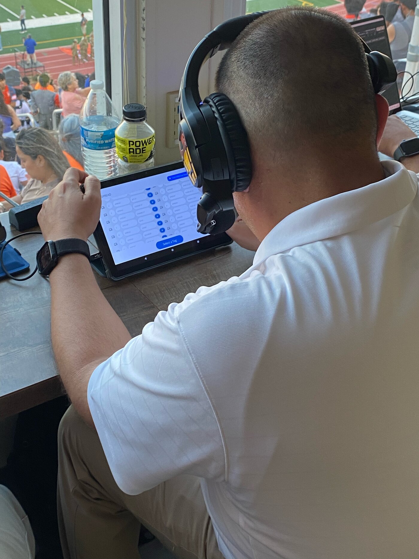 Coordinator sending calls from the press box tablet